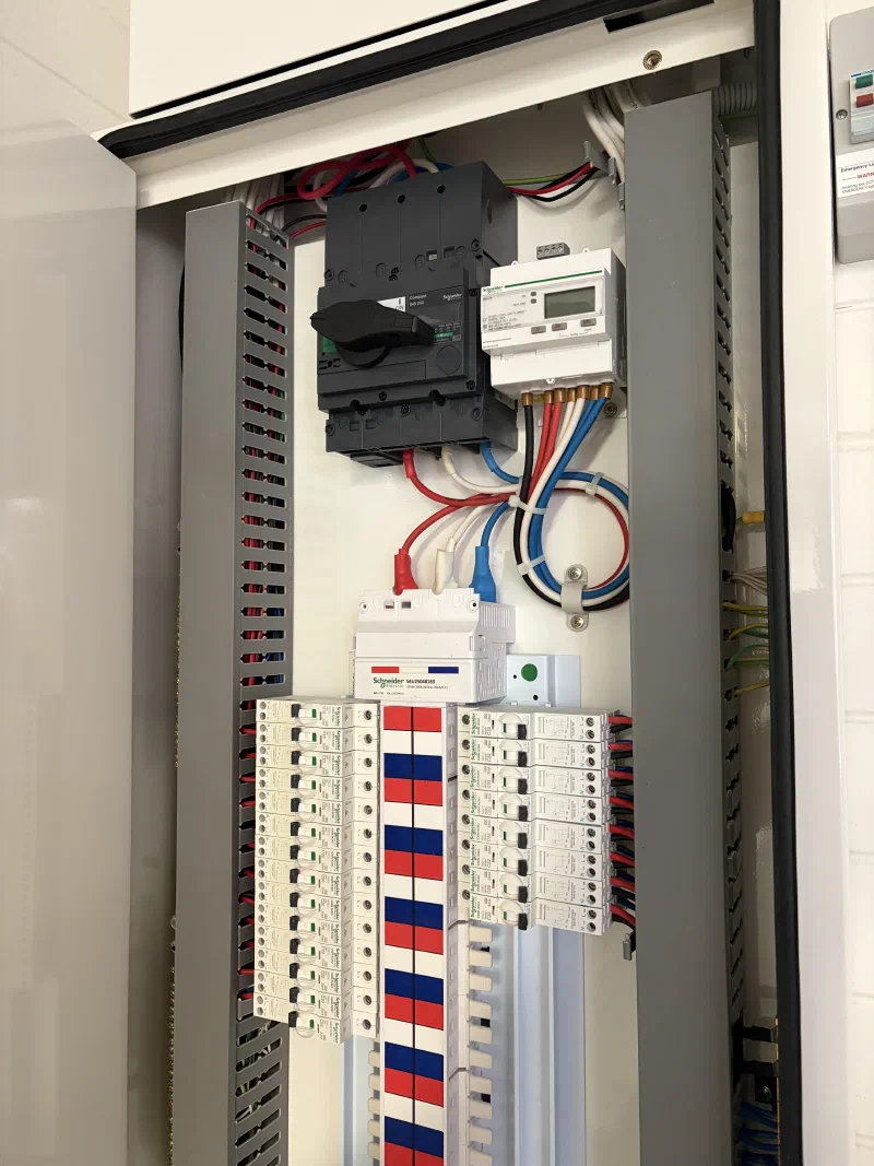 Commercial switchboard with circuit breakers, metering and wiring